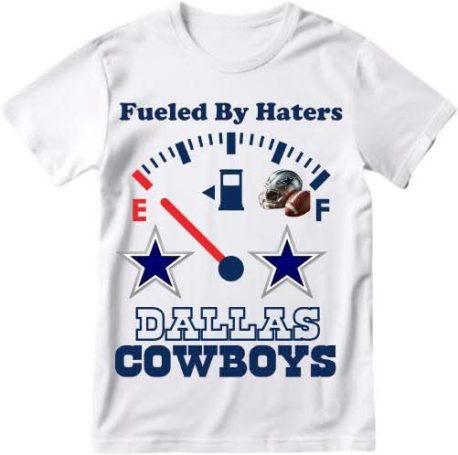 White t-shirt featuring a fuel gauge graphic and "Fueled By Haters" text, Dallas Cowboys logo.